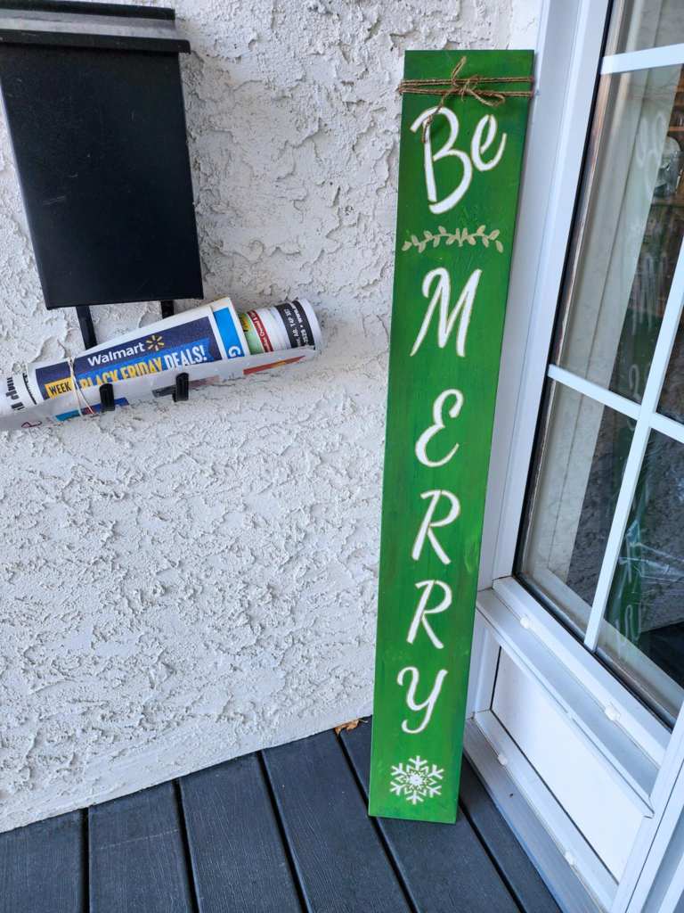 A Be Merry porch sign for the holidays. 
