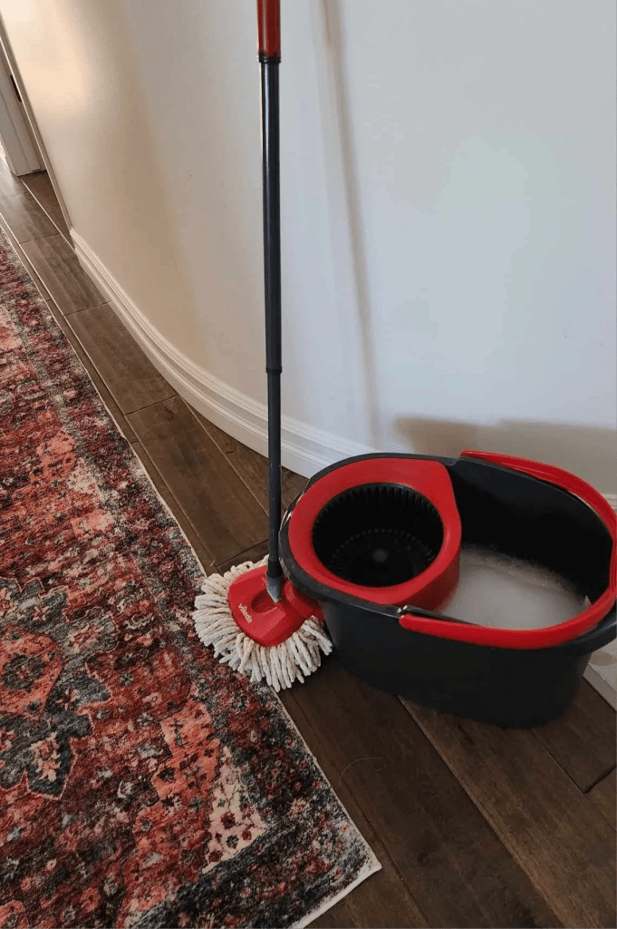 A spin mop to clean the floors and walls. Easy to use and do regularly. 