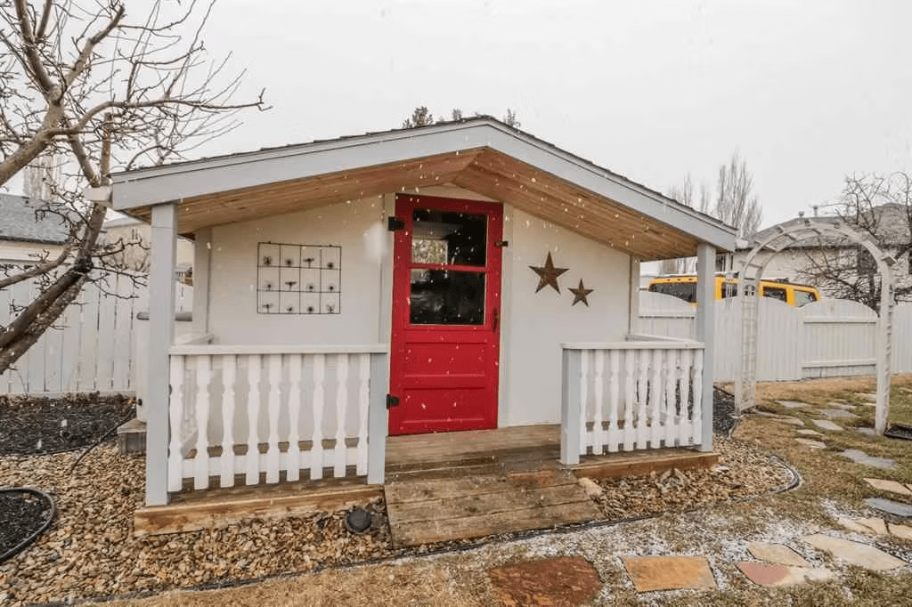 Sweet garden shed with a red door. 