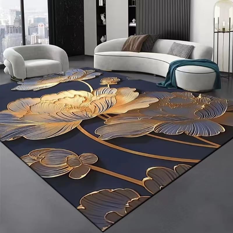 A luxurious rug featuring intricate golden floral designs on a dark blue background, placed in a modern indoor living space with contemporary furniture.