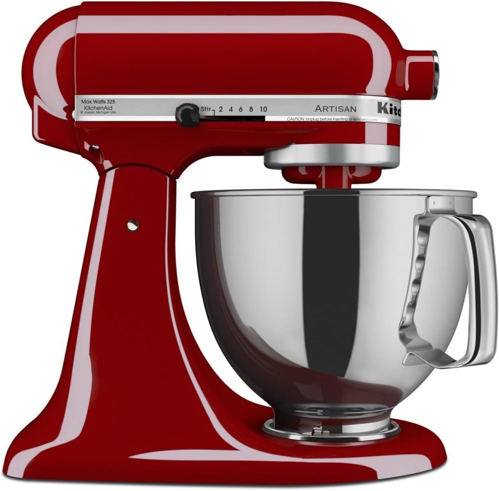 Red KitchenAid stand mixer with a stainless steel bowl.