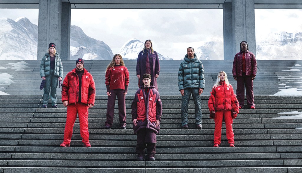 Canadian Olympians standing on stairs in a mountainous outdoor setting, wearing colorful winter attire, showcasing varied styles of jackets and outerwear.