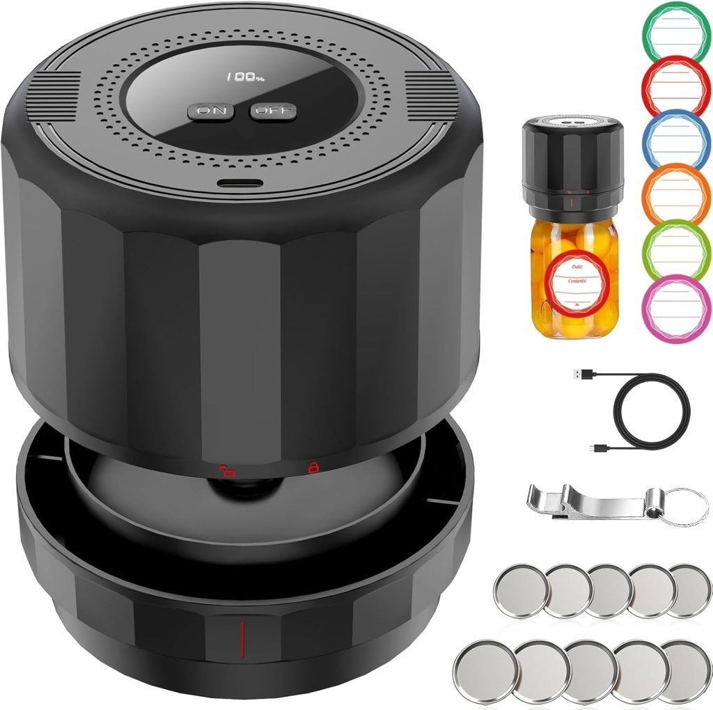 A black vacuum sealer with a digital display and buttons, accompanied by accessories including a vacuum jar, colored rings, a USB cable, and several sealing discs.