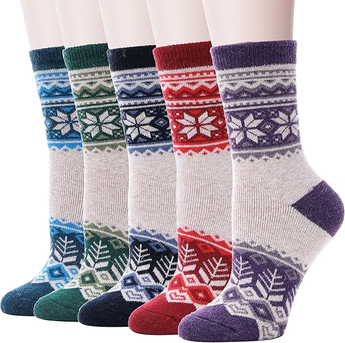 A set of colorful winter socks featuring various festive patterns, including snowflakes and geometric designs.