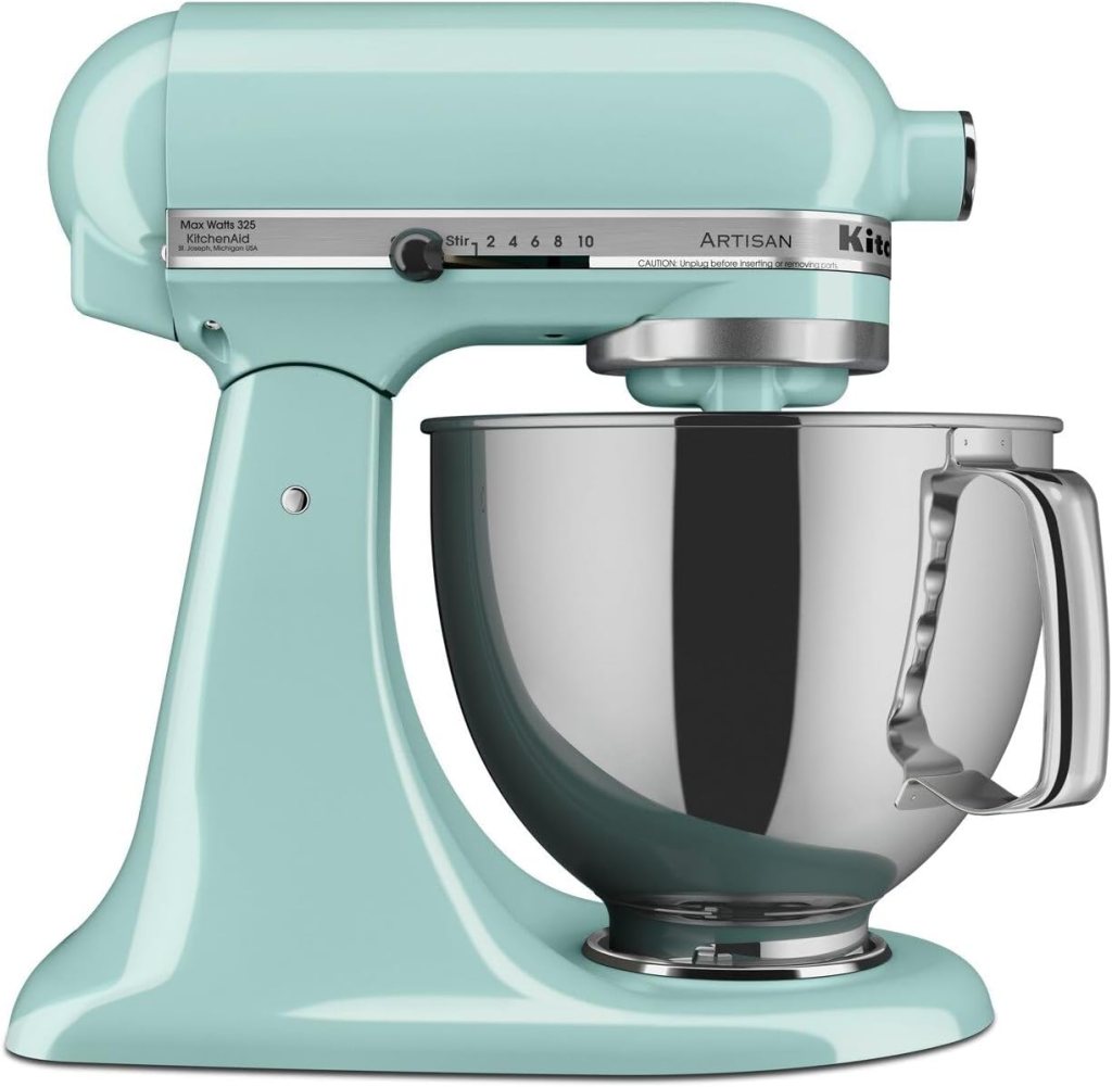 A mint green KitchenAid Artisan stand mixer with a stainless steel mixing bowl.