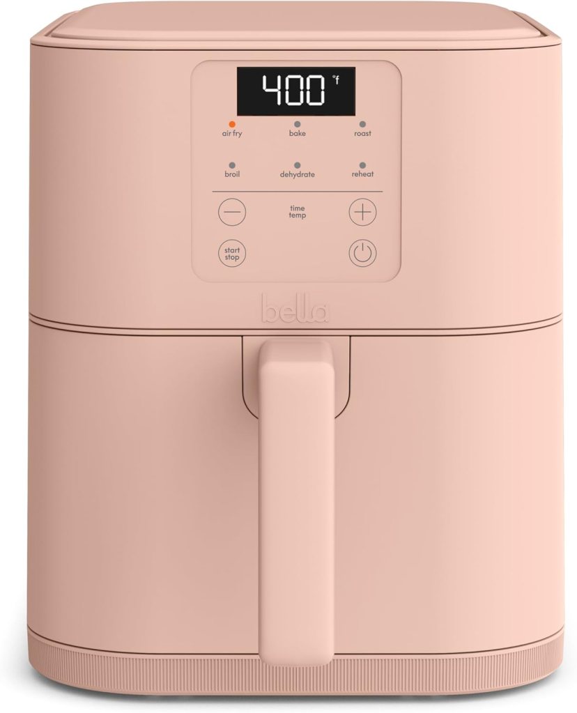 A pink air fryer with a digital display showing a temperature of 400°F and various cooking options including air fry, bake, roast, broil, dehydrate, and reheat.