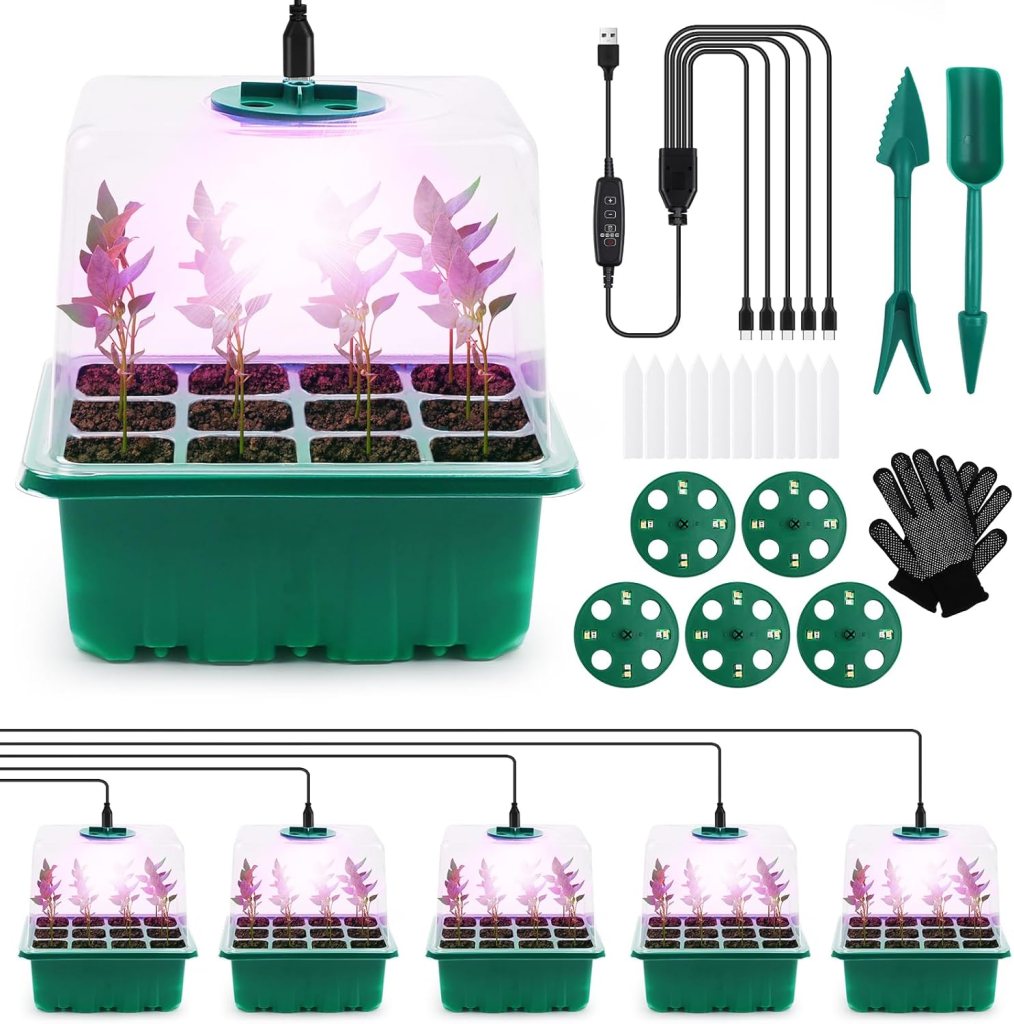 A home indoor herb garden kit featuring a green base with a transparent dome and a growing light, showcasing young plants in seedling trays. Accessories include a USB cable, planting tools, plant markers, and gloves.