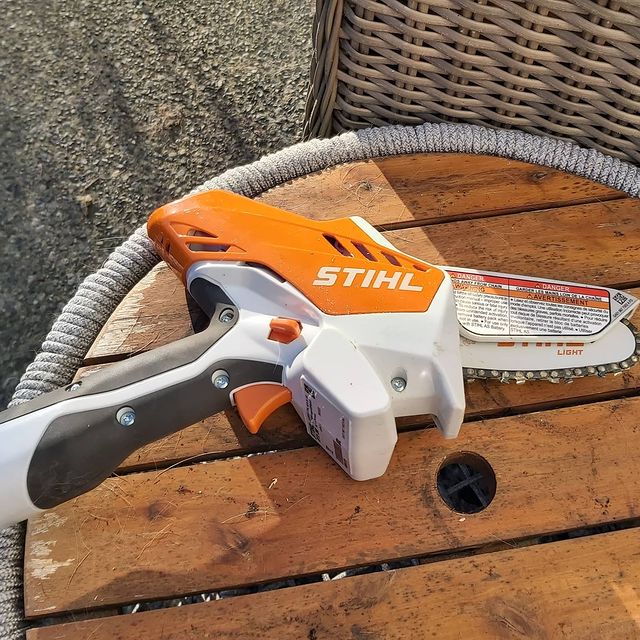 A mini saw for pruning trees and shrubs. 