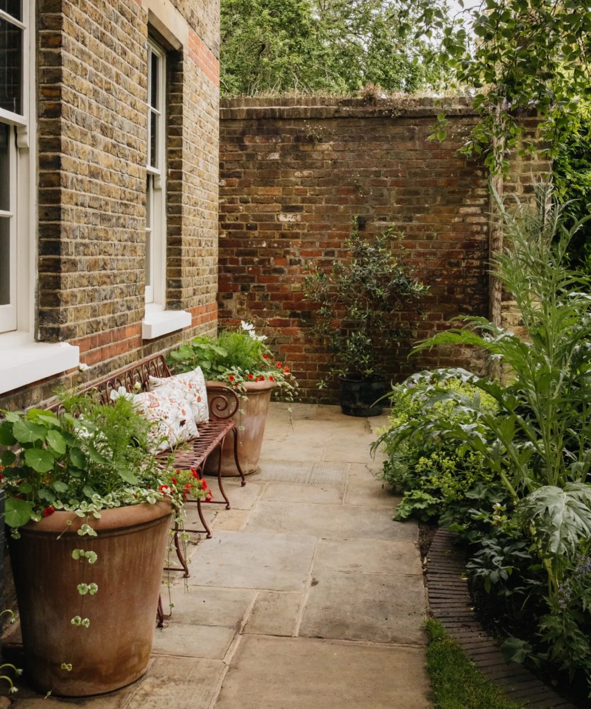 Terracotta pots on a limestone patio. 
